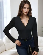 Black scalloped lace long sleeve bodysuit front view