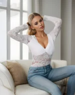 White plunge neck long sleeve lace bodysuit when siting